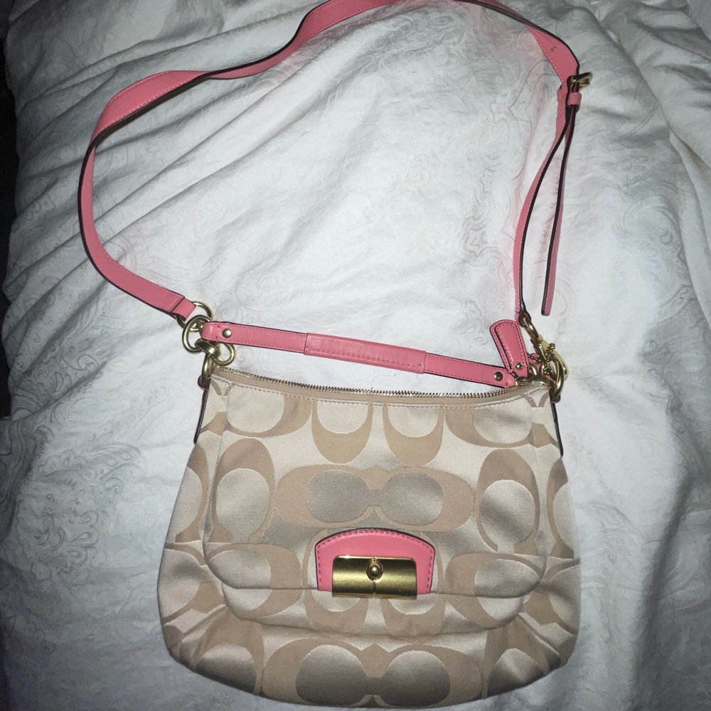 pink and cream Coach purse